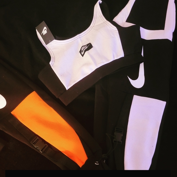 orange nike jumpsuit womens